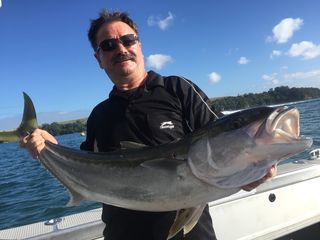 Kevin with a big kingfish on Megabites Fishing Charter