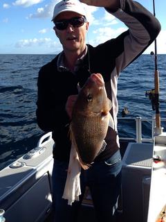 Jigging for Snapper in the deep