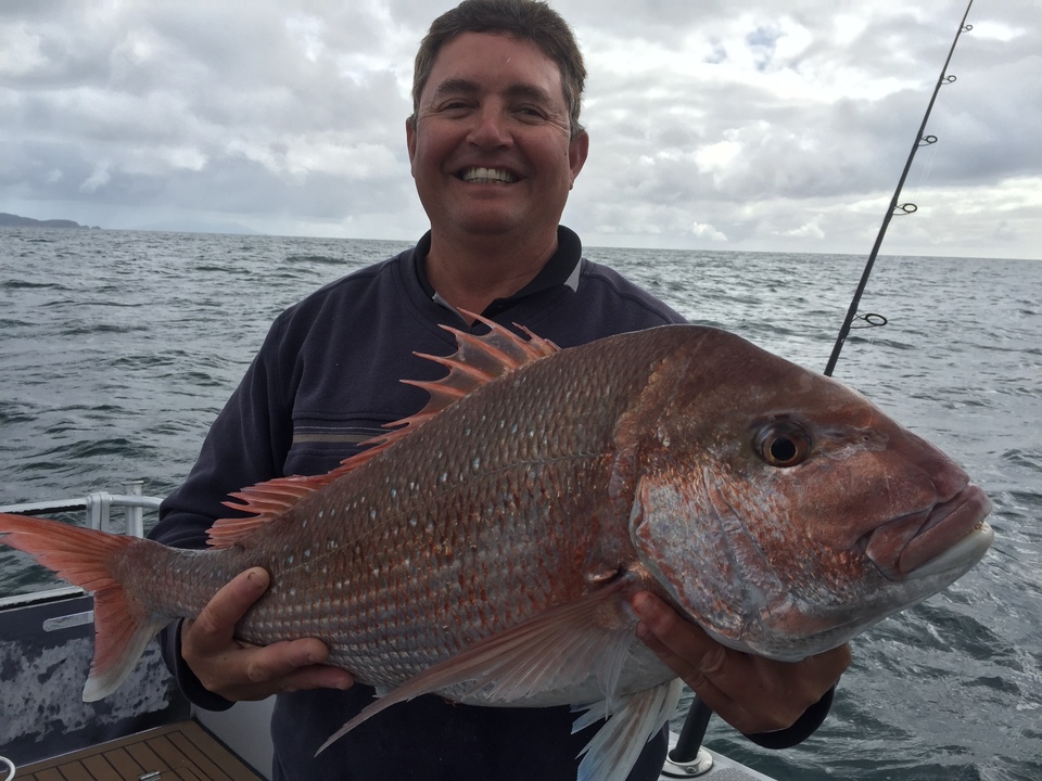 The skipper Darell show the crew how to catch big snapper